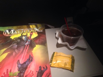 Ending the trip like I began it: with a Jack & Coke on the plane (although this time I have some new reading material).